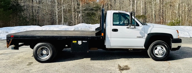 W/NEW 12’ CM FLATBED W/NEW 12’ CM FLATBED
