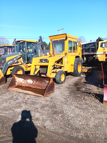 JOHN DEERE 310A BACKHOE.