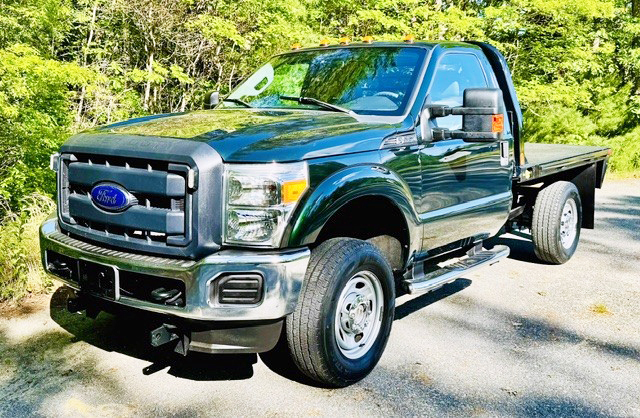 2012 FORD F250 4X4 W/8’ CM FLATBED 2012 FORD F250 4X4 W/8’ CM FLATBED
