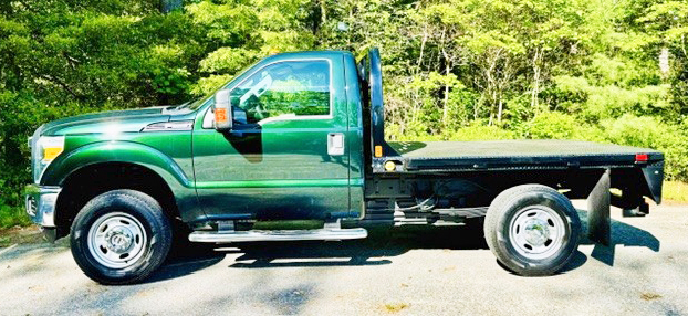 2012 FORD F250 4X4 W/8’ CM FLATBED
