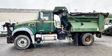 2010 MACK GU712 DUMP. 11’ POWER ANGLE PLOW  WING PLOW